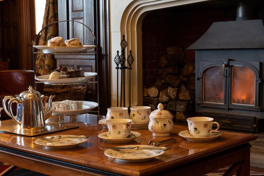 Afternoon Tea By A Fireplace